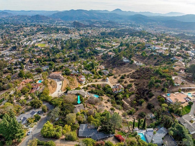 drone / aerial view featuring a mountain view