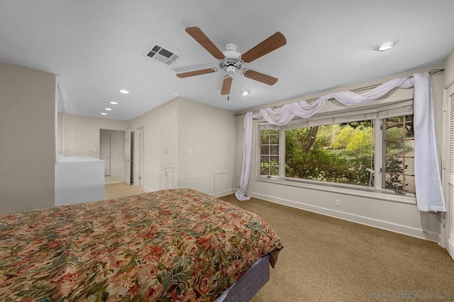 unfurnished bedroom featuring ceiling fan and carpet