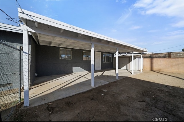 view of patio / terrace with a storage shed