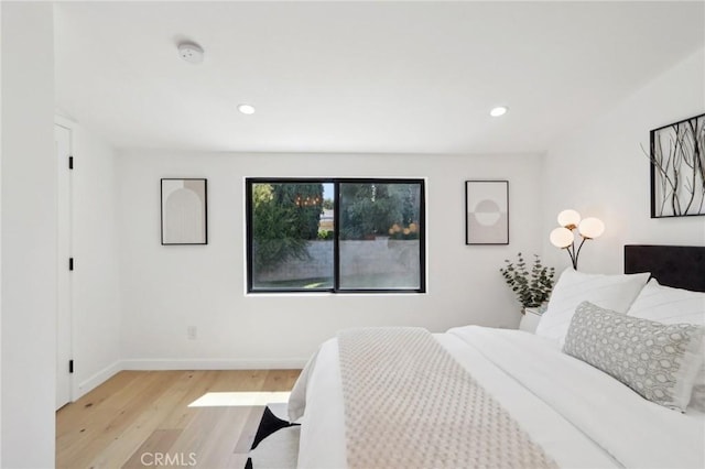 bedroom featuring light wood-type flooring