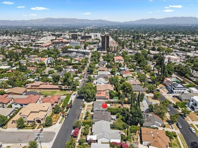 drone / aerial view featuring a mountain view