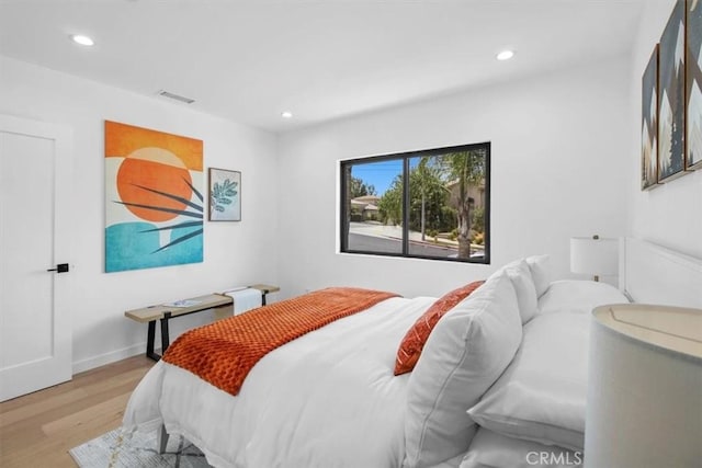 bedroom featuring light wood-type flooring