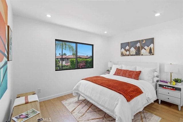 bedroom featuring light hardwood / wood-style flooring