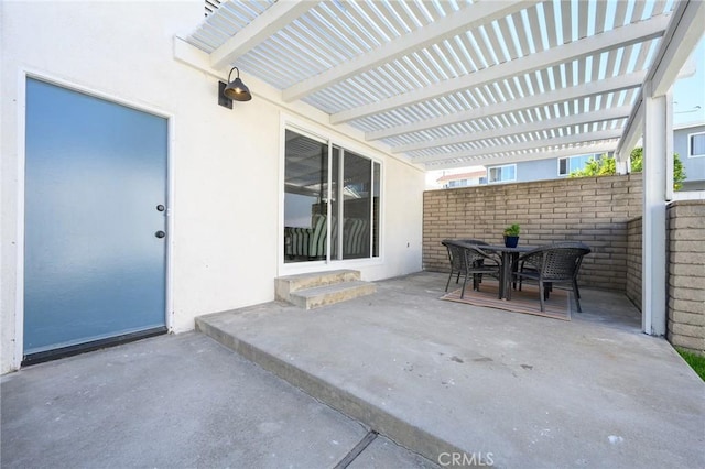 view of patio featuring a pergola