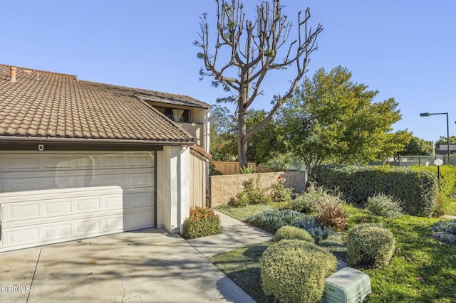 exterior space with a garage