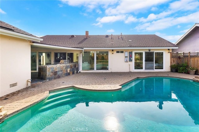 view of pool featuring a patio