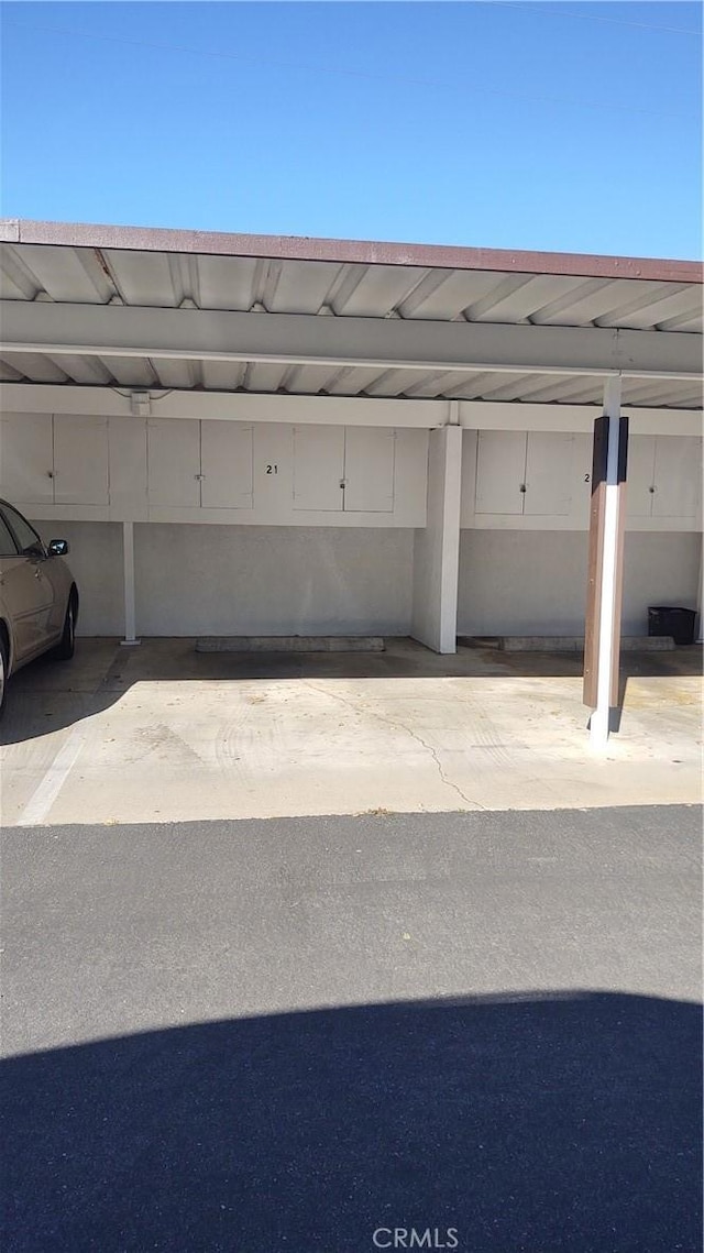 exterior space featuring a carport