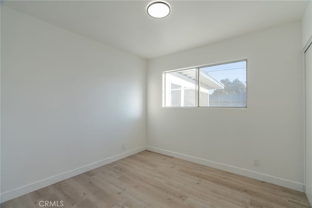 empty room featuring light hardwood / wood-style floors