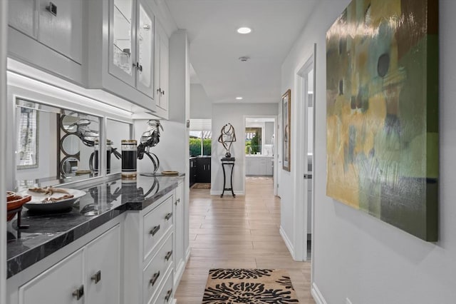 hallway featuring light hardwood / wood-style flooring