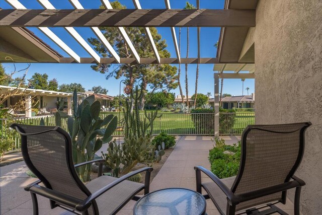 view of patio featuring a pergola