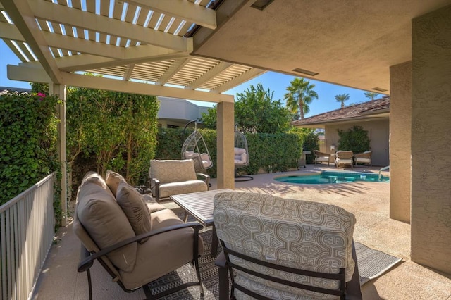 view of patio featuring a pergola, outdoor lounge area, and a fenced in pool