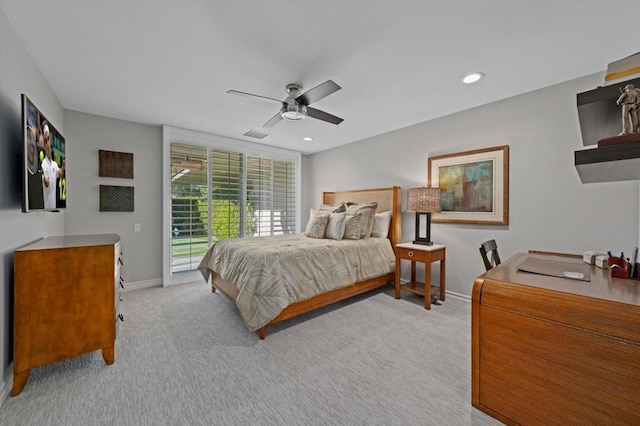 carpeted bedroom with ceiling fan and access to exterior