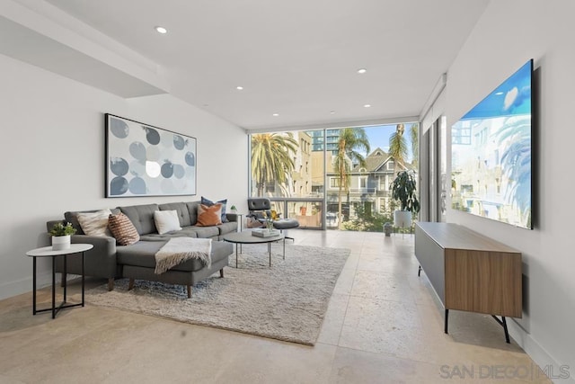 living room with floor to ceiling windows