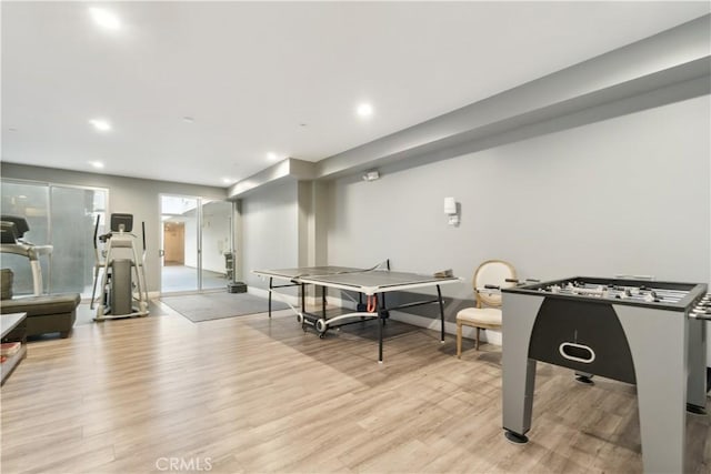 recreation room featuring light hardwood / wood-style floors