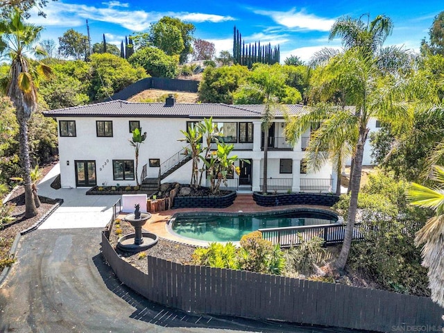 view of pool featuring a patio