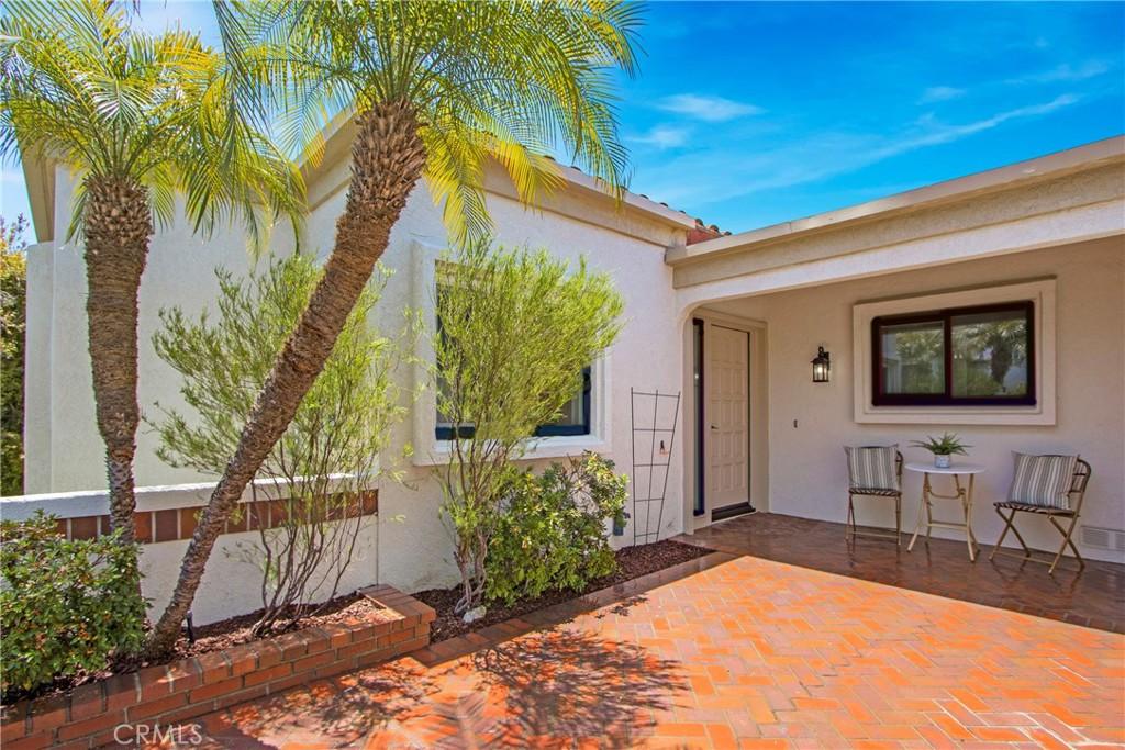 doorway to property featuring a patio area