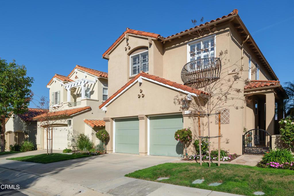 mediterranean / spanish house with a garage