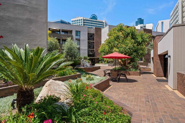 view of home's community with a patio