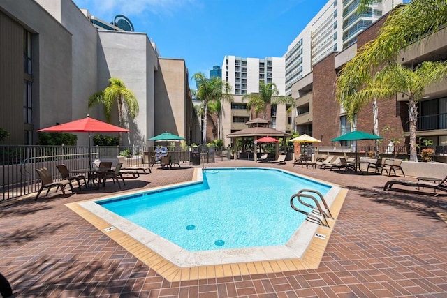 view of swimming pool featuring a patio area