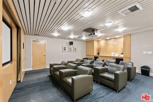 home theater featuring wood ceiling