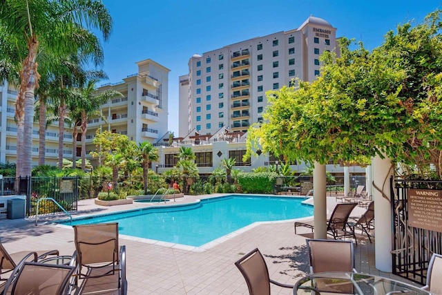 view of swimming pool featuring a patio