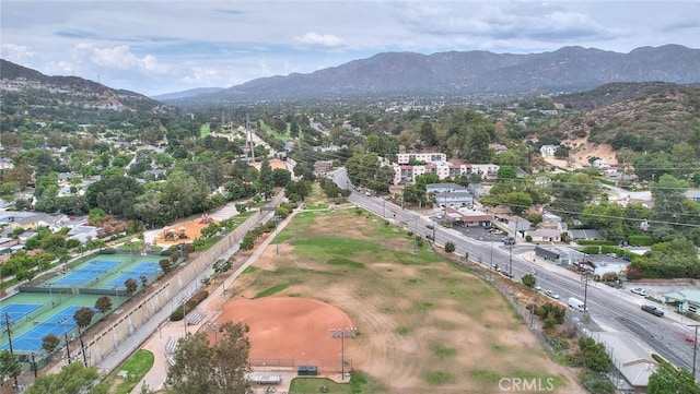 drone / aerial view featuring a mountain view