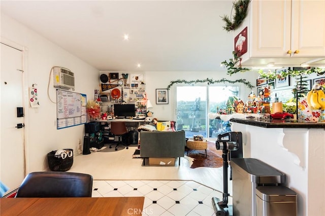 dining area featuring a wall unit AC