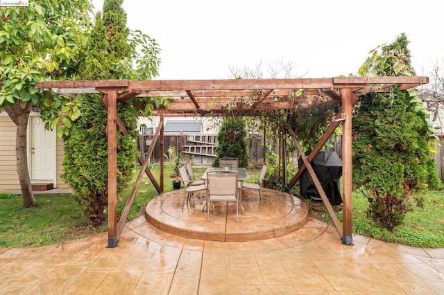 view of patio with a pergola and a grill