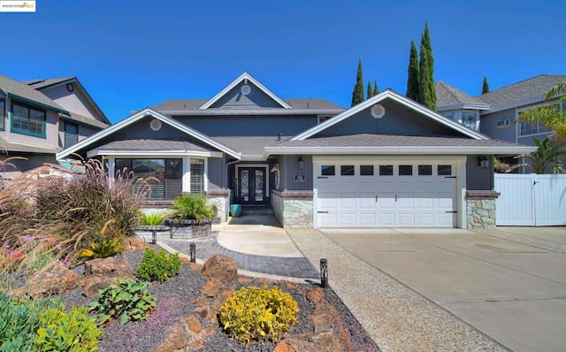 view of front of home with a garage and french doors