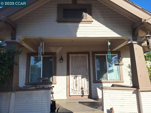 property entrance with a porch