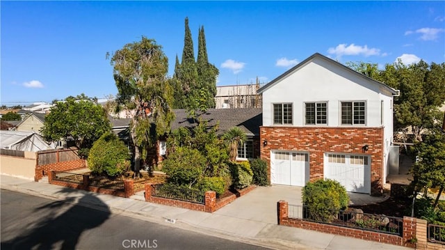 view of front of property with a garage