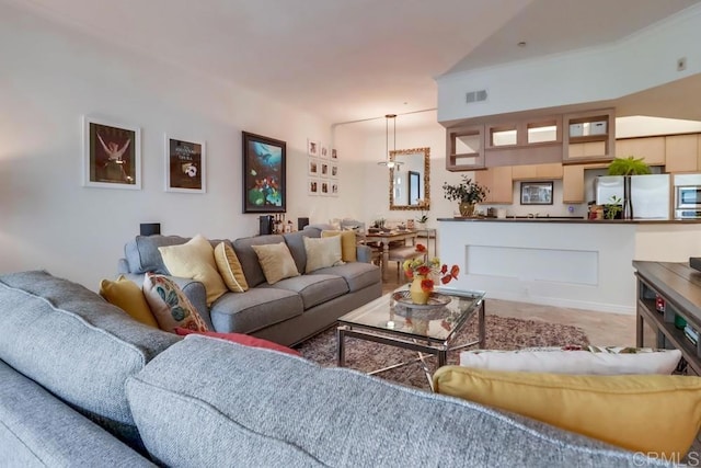 living room featuring crown molding