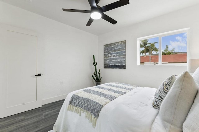 bedroom featuring ceiling fan and dark hardwood / wood-style flooring