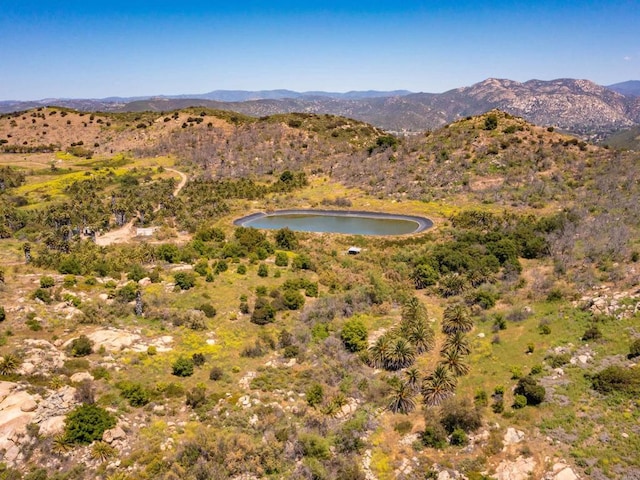 mountain view with a water view