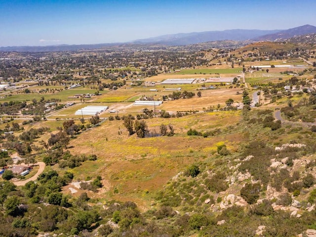 bird's eye view with a rural view and a mountain view