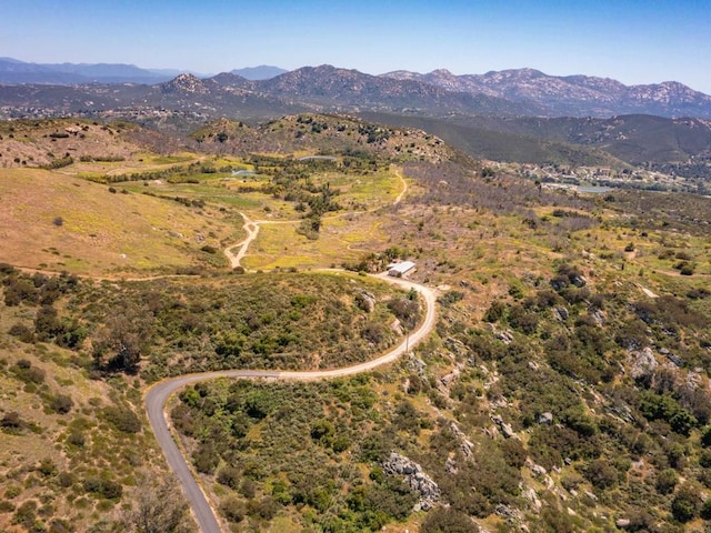 drone / aerial view featuring a mountain view