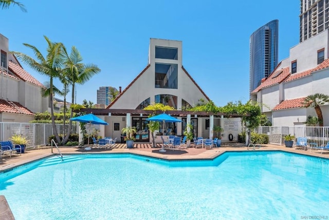 view of swimming pool with a patio area