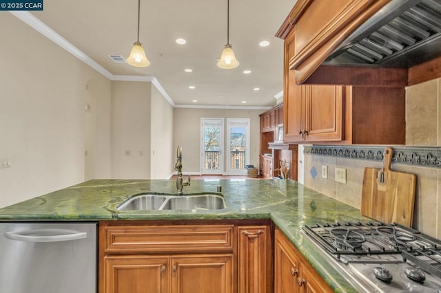 kitchen featuring custom exhaust hood, sink, crown molding, hanging light fixtures, and stainless steel appliances