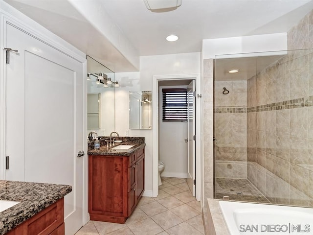 full bathroom with toilet, vanity, separate shower and tub, and tile patterned floors