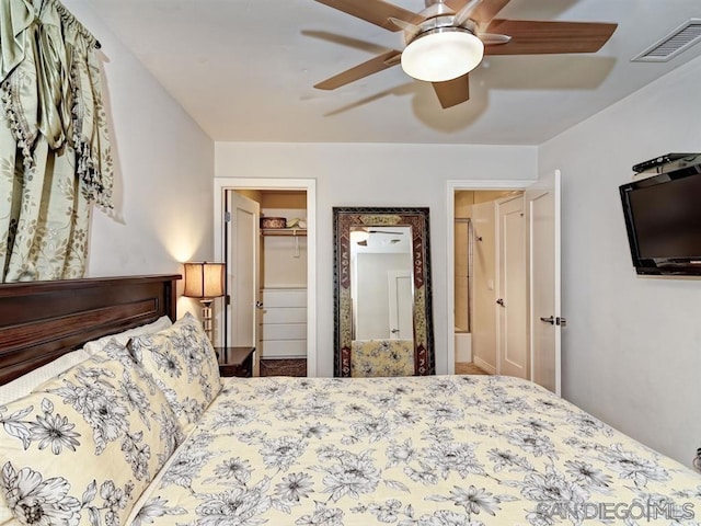 bedroom with ceiling fan and a closet