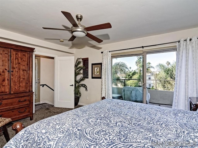 bedroom featuring ceiling fan, dark colored carpet, and access to outside