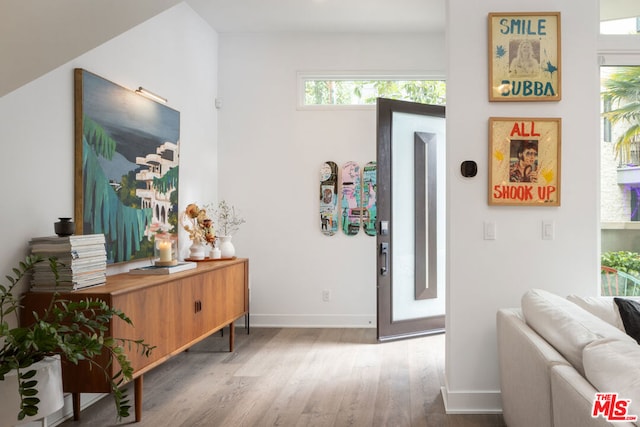 corridor featuring hardwood / wood-style flooring