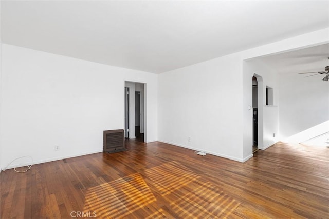 empty room featuring ceiling fan and hardwood / wood-style flooring