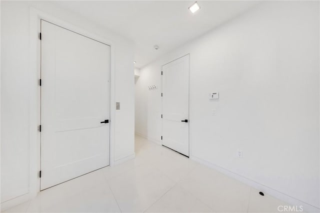 interior space with light tile patterned floors