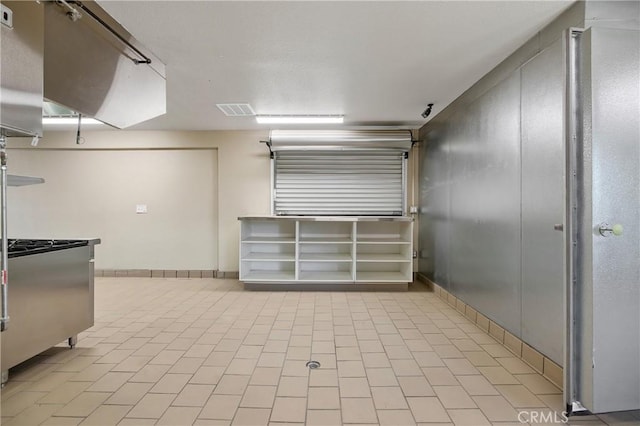 interior space with light tile patterned floors