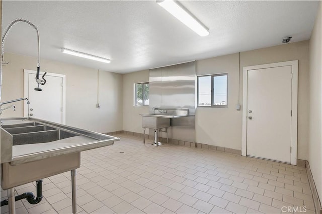 kitchen with light tile patterned floors