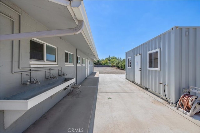 view of home's exterior with a patio area