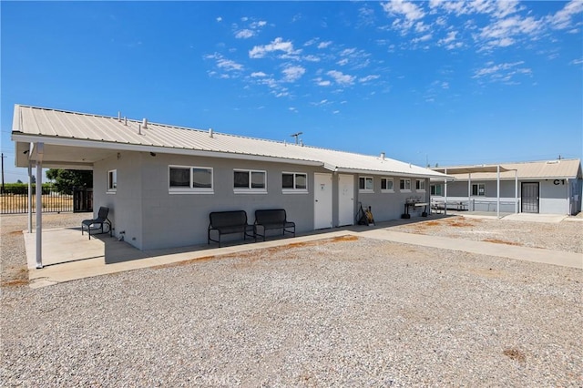 rear view of house with a patio area