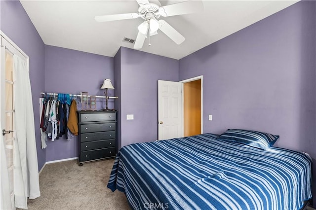 bedroom with ceiling fan and carpet