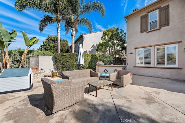 view of patio / terrace featuring area for grilling and outdoor lounge area